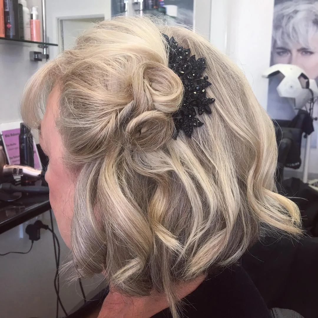 Blonde occasion updo with jewelled hairpiece, finished at Jolin's