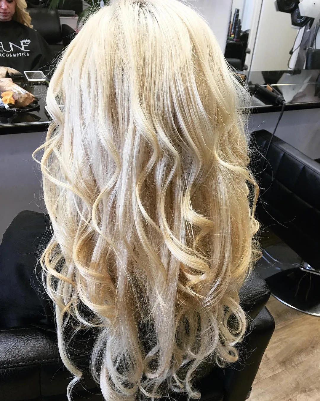 Full-volume blonde curls, back of head, finished at Jolin's Hair Design
